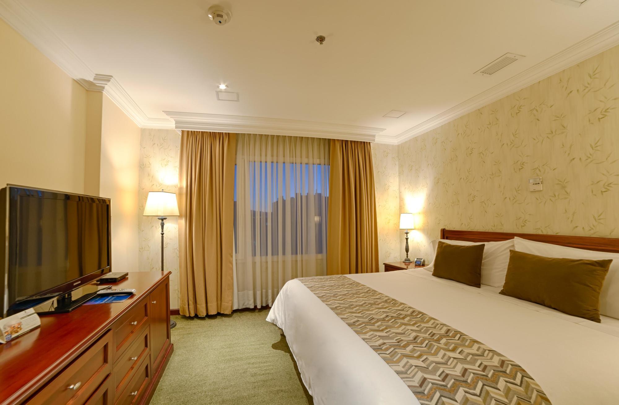 Casa Dann Carlton Hotel & Spa Bogota Buitenkant foto A bedroom at the hotel
